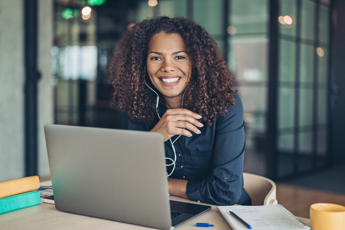 Woman working on a laptop in a business setting