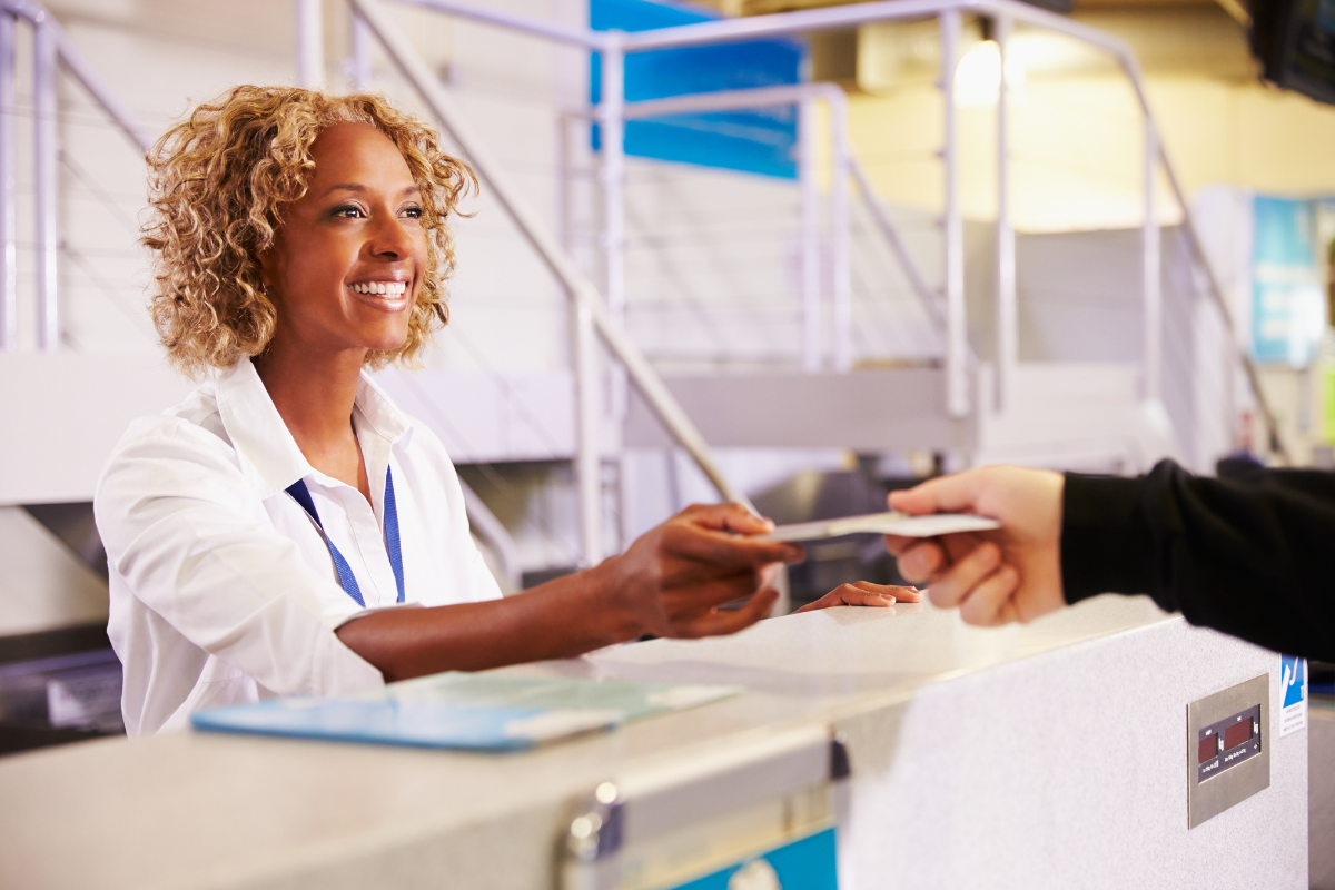 Woman working at an airport check-in desk